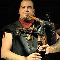 Dudelsackspieler mit Tatoo